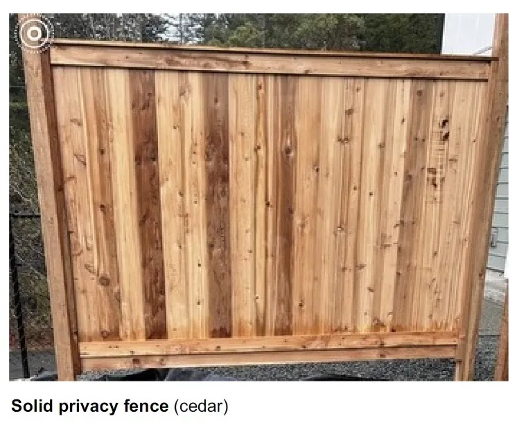 Photograph of a sample solid cedar privacy fence section