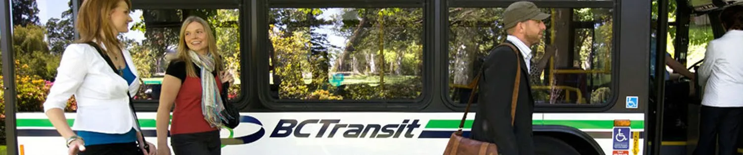 Group of passengers boarding a BC Transit bus