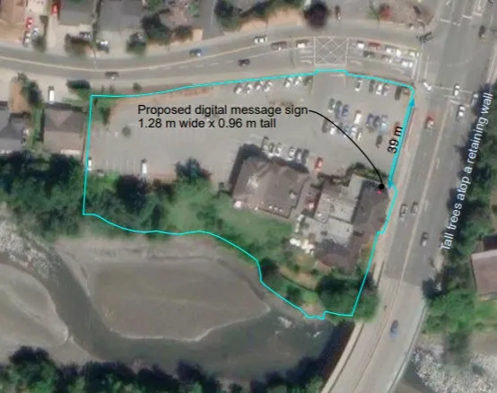 Aerial map of 498 Island Highway property showing the location of the proposed digital message sign relative to Six Mile Road and Island Highway