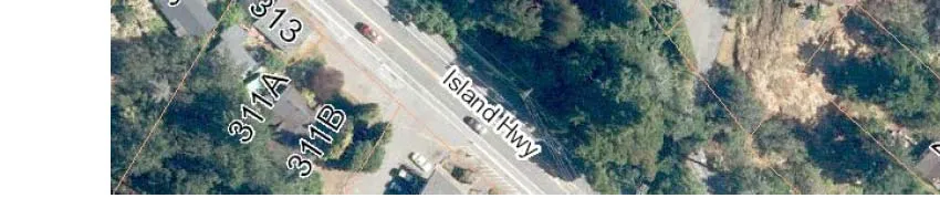 Bottom-left portion of an aerial map showing properties along Island Highway