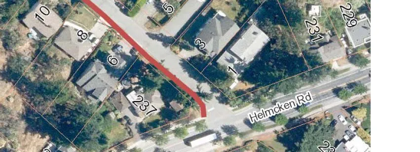 Mid-right portion of an aerial map showing residential properties and property lines near Helmcken Road