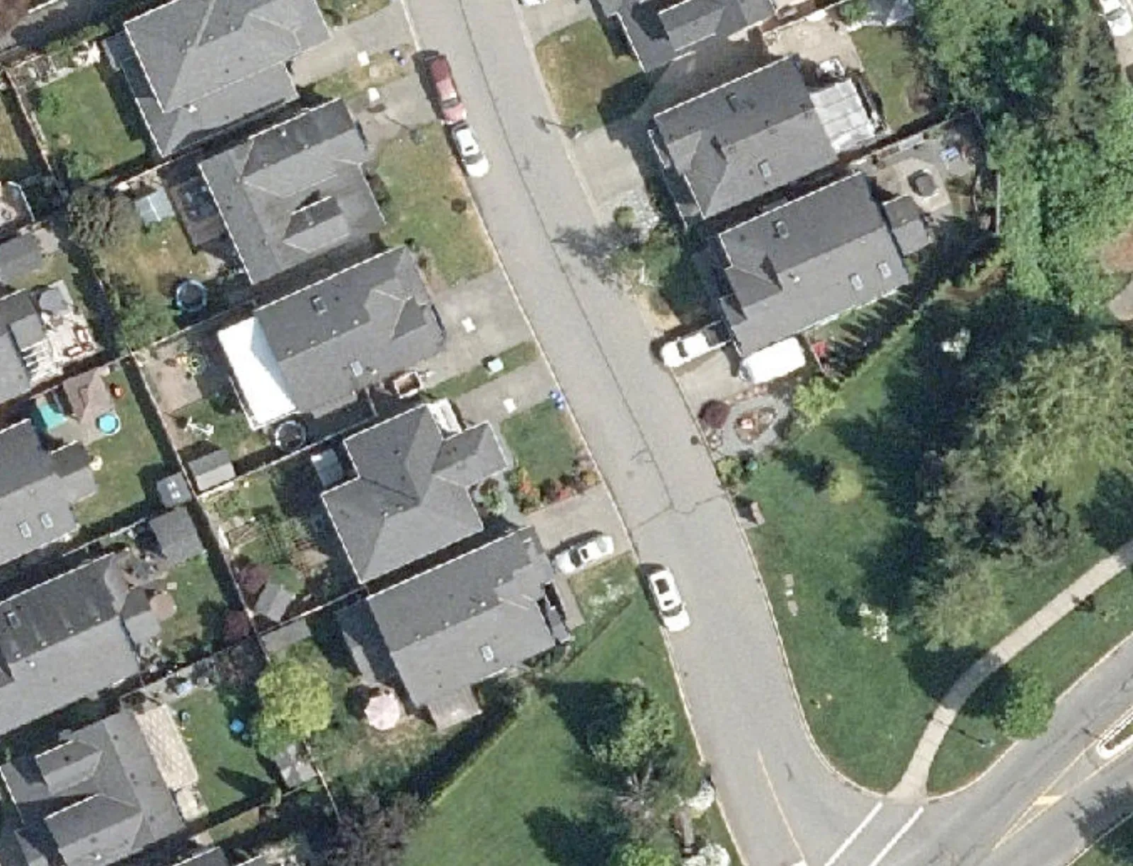 Aerial view of residential neighborhood showing lots 101-109 on Thetis Vale Cres and 2443-2447 on Chilco Rd