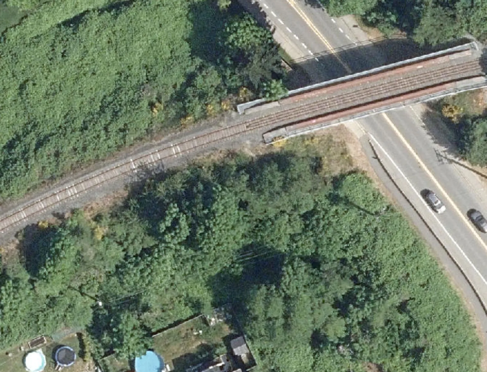 Aerial view of the railway bridge crossing over Six Mile Rd