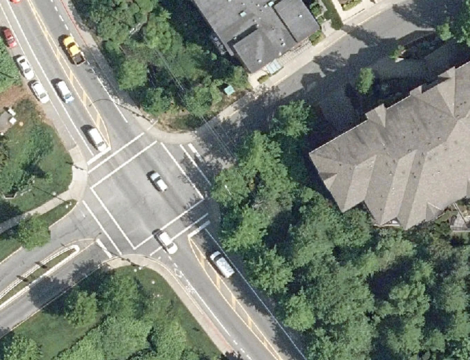 Aerial overview of the intersection and residential properties near Area 3