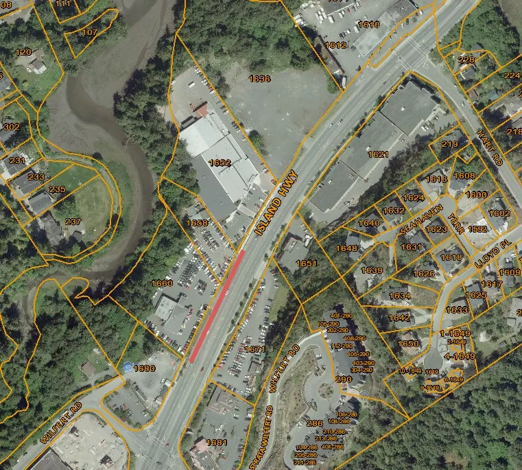 Aerial map showing property parcels and a red highlighted section of Island Highway between Wilfert Road and Hart Road.