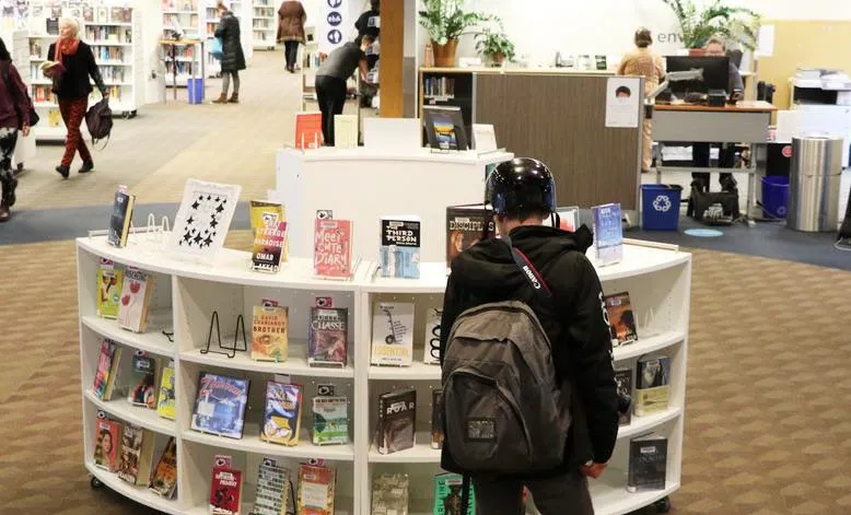 Patrons using public computer stations designated as "Express" terminals.