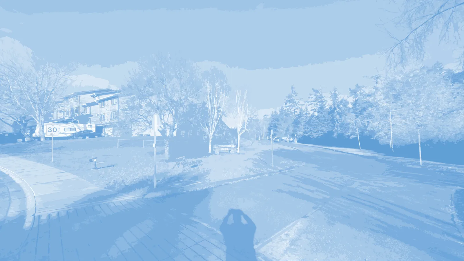 photo rendering showing the proposed placement of a Park Identification Sign at a park entrance alongside a roadway