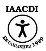 Proposed logo for IAACDI featuring a universal accessibility symbol and "ESTABLISHED 1989"