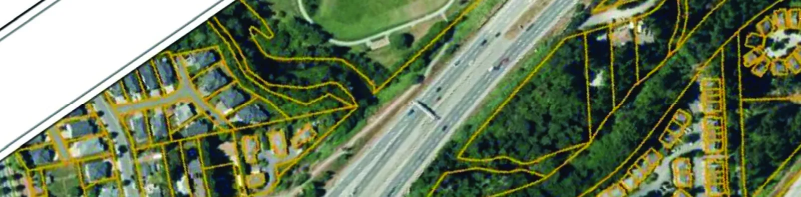 Close-up aerial map detail showing property boundaries and highway access near the Erskine Lane development site