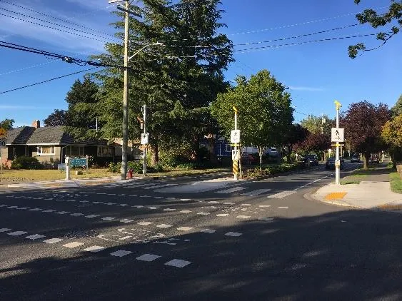 Green conflict zone markings at an intersection