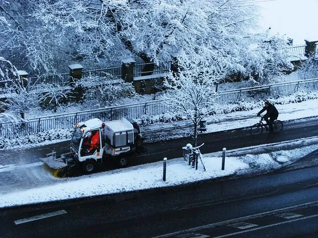 Example of a street sweeper clearing snow in a bicycle lane