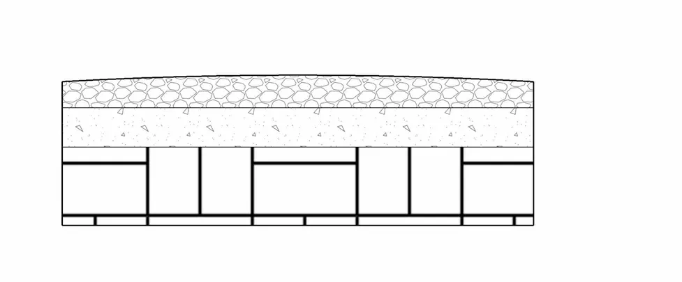 Cross-section diagram showing gravel to crown on center over a compacted road base and existing soil