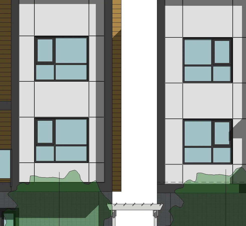 Facade detail of Building 1 showing a mix of panel materials and windows