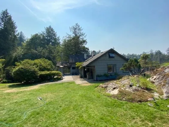 Another view of the existing house and yard at Lot 2