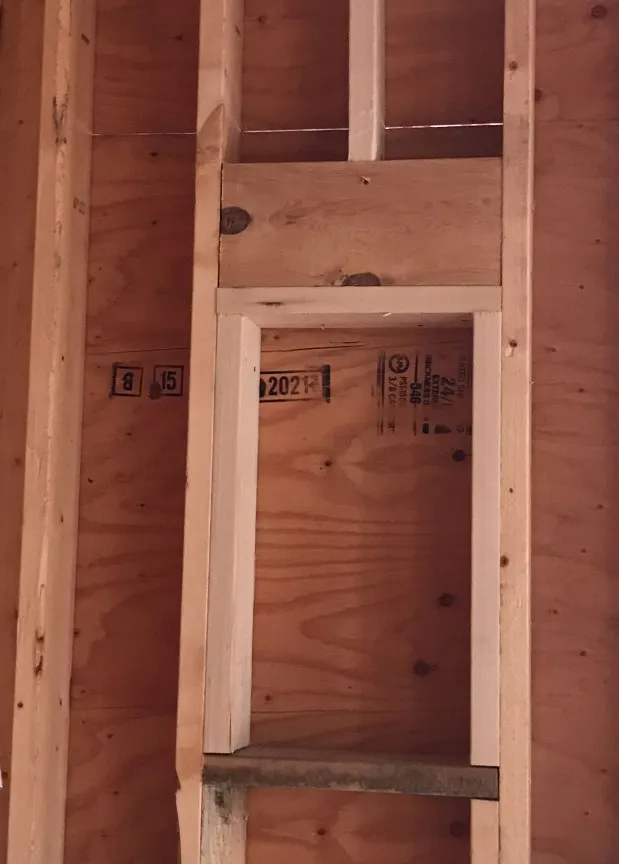 Photo of plywood sheathing on a wall