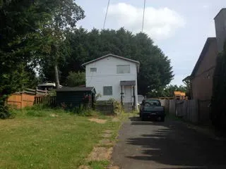 Original small white house at 24 Vickery Road