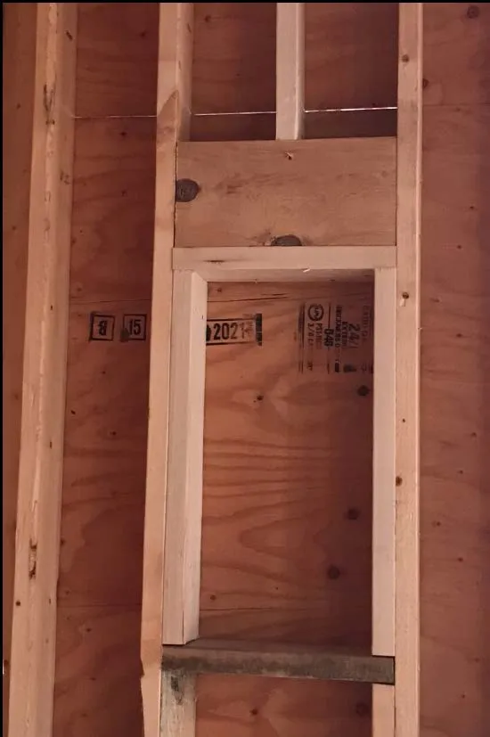 Another view of interior house framing showing wall sections