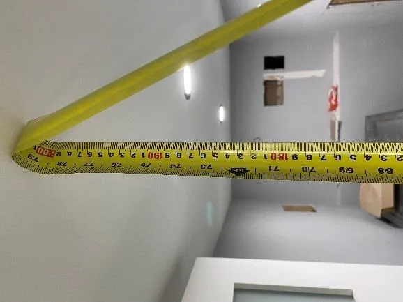 Tape measure showing ceiling height