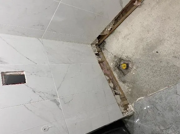 Capped plumbing in bathroom