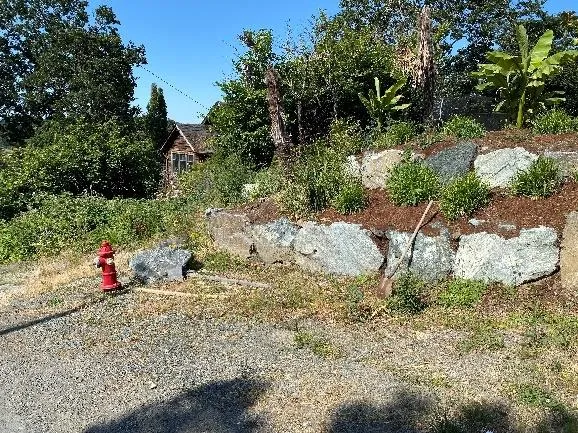 Measuring rock retaining walls