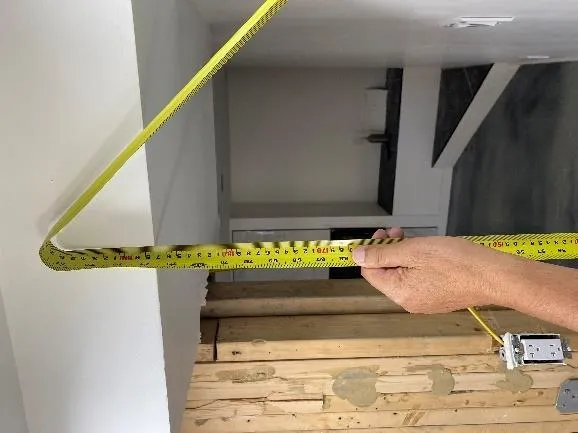 Measuring tape showing ceiling height
