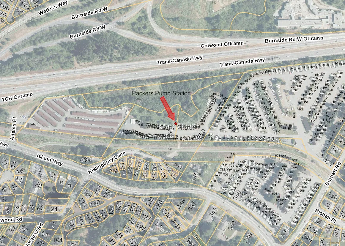 Map showing the location of the Packers Pump Station, indicated by a red arrow, situated between the Trans-Canada Highway and residential areas along Kislingbury Lane and Island Highway.