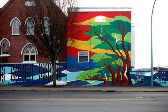 Rendering showing tree trunks and an optical illusion of a train tunnel