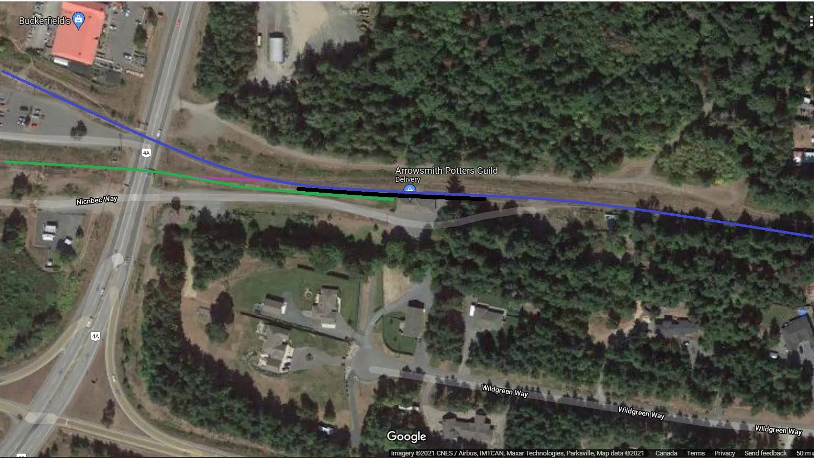 Aerial view of the rail junction in Parksville showing the Victoria Sub and Port Alberni Sub lines