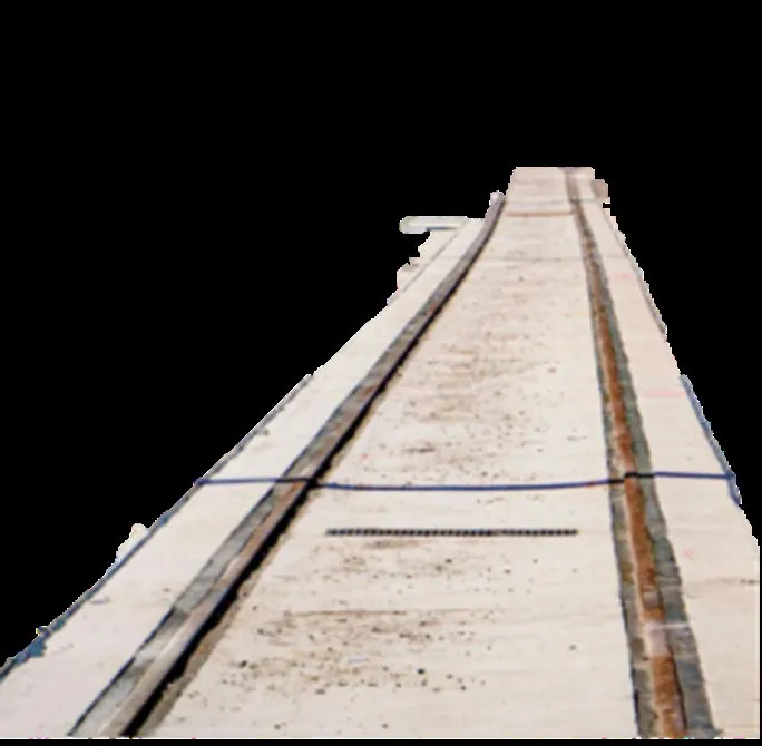 Rendering of a set of railroad tracks on a gravel ballast bed