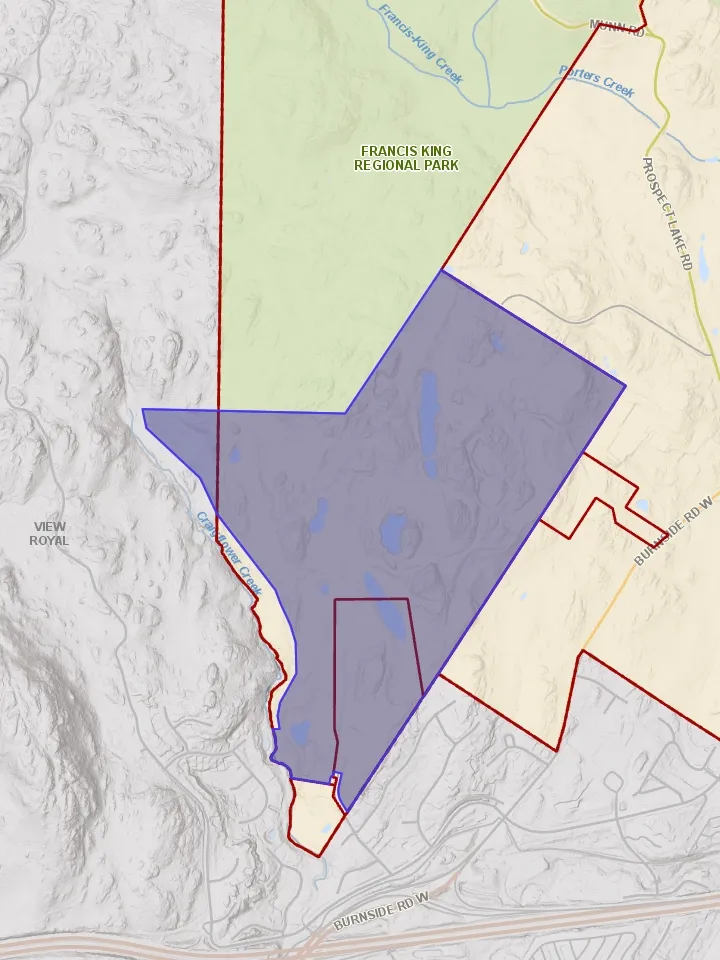 Map of a portion of the District of Saanich featuring Francis King Regional Park, View Royal, and surrounding areas. The map shows geographical features like Crane Power Creek, Porters Creek, and Francis-King Creek, alongside roads such as Burnside Rd W and Prospect Lake Rd. A large area is highlighted with a blue-shaded polygon.