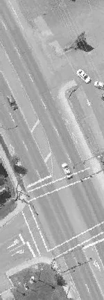 Aerial view of Island Highway with a bus and several cars