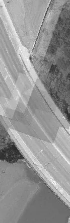 Aerial view of a bridge structure spanning a body of water