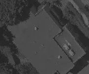 Aerial view of a building roof section