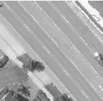 Aerial view of a roadway with a single vehicle visible