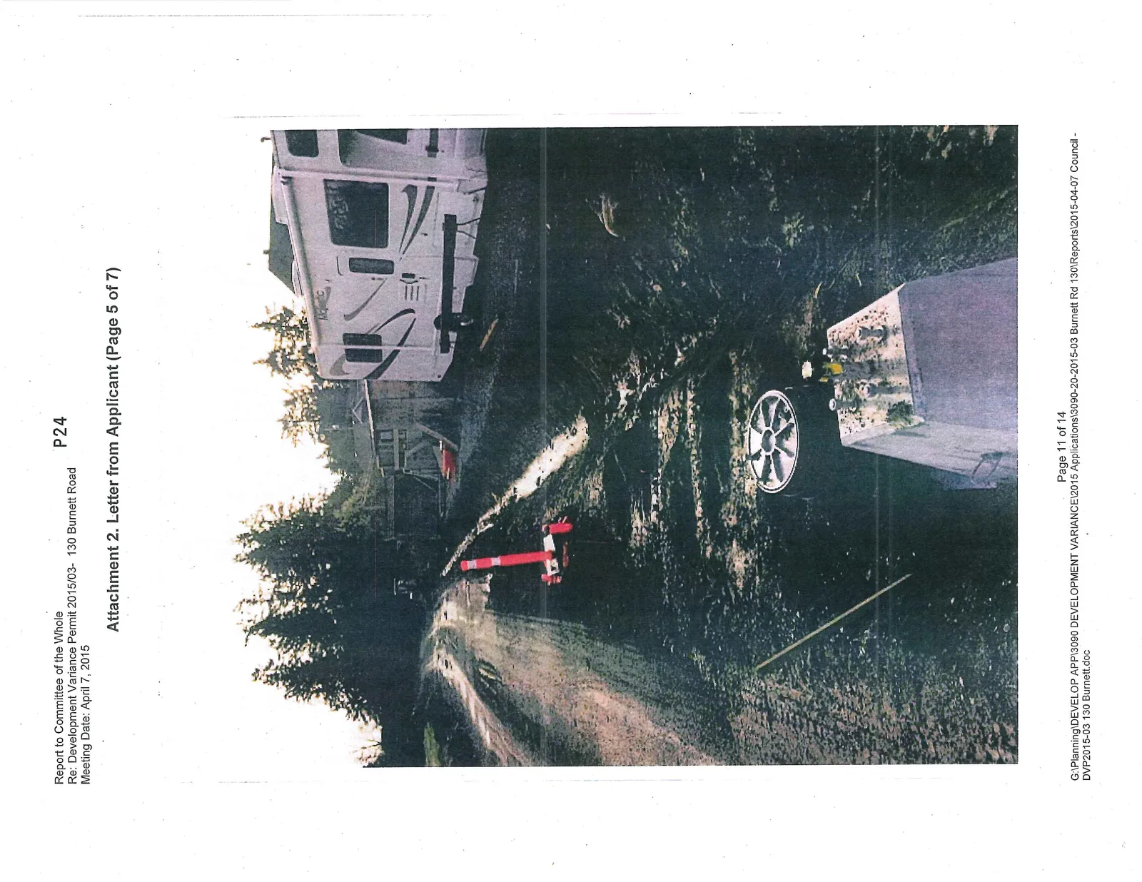 Photo of the construction site near the property showing mud, utility infrastructure, and a parked RV