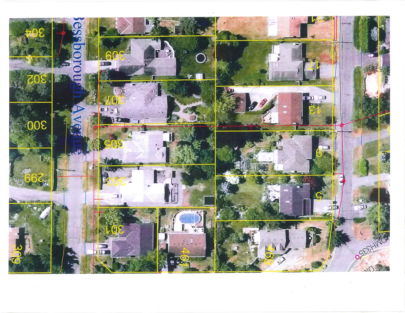 Aerial photograph of a residential neighborhood showing property parcel boundaries in yellow, utility lines in red and blue, and house numbers. The main street shown is Bessborough Avenue.