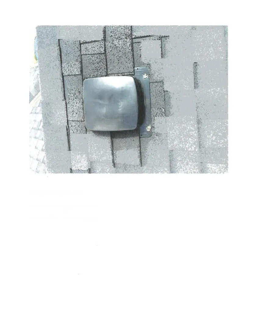 Close-up of a new vent installed on a shingled roof