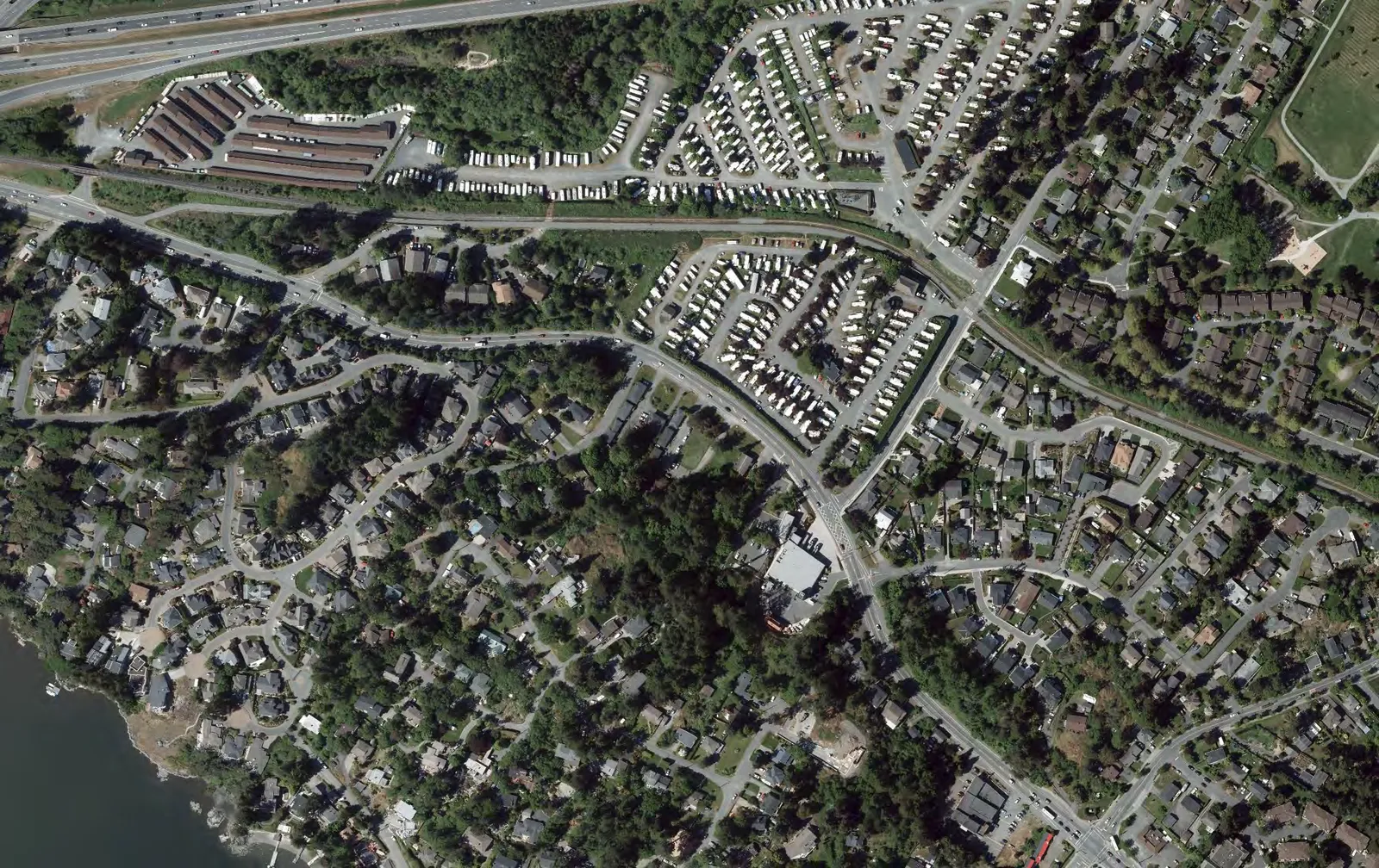 Comparison maps showing tree preservation. Previous concept plan: 51 trees retained, 138 trees removed. New concept plan: 146 trees retained, 43 trees removed.