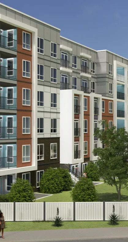 Rendering of a contemporary multi-story residential building with balconies and a white picket fence