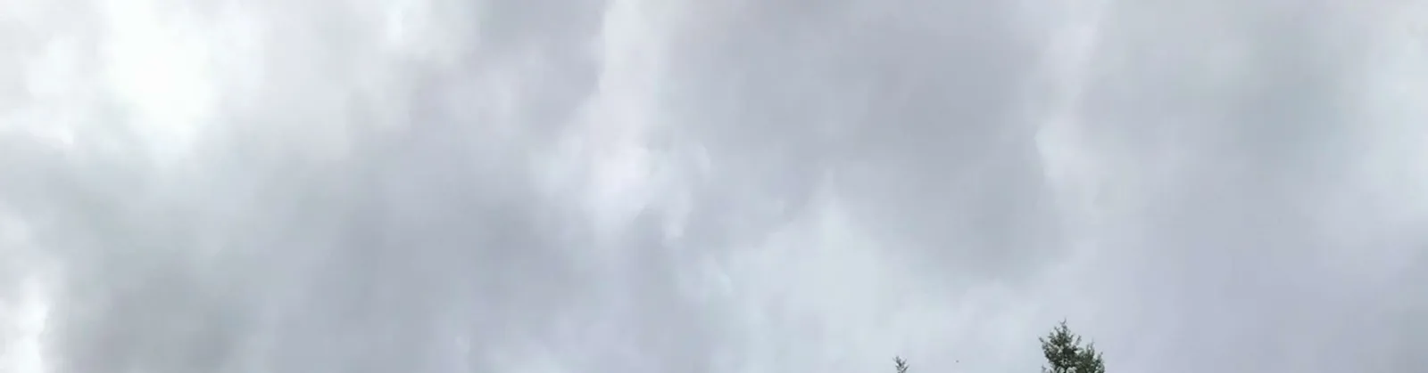 View of a cloudy sky above the property