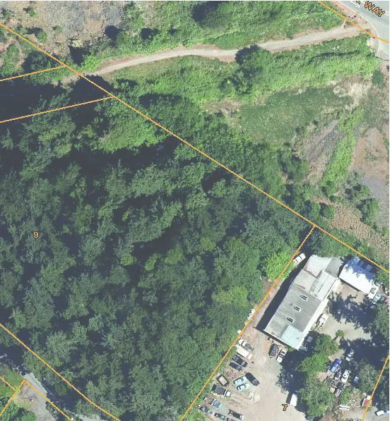 Close-up aerial view focusing on the existing structure at 10 Erskine Lane.