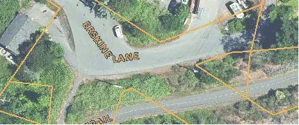 Aerial view showing the southern site boundary along Erskine Lane and its proximity to the Galloping Goose Trail.