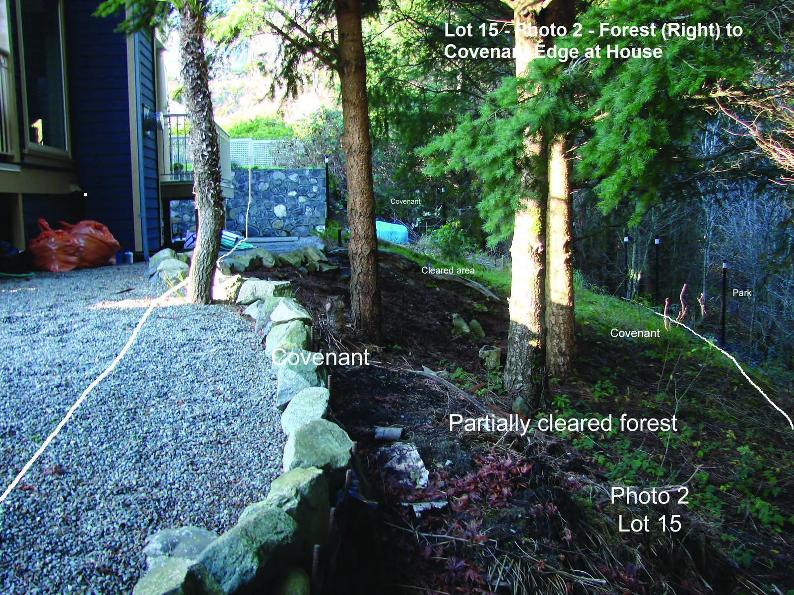 Photograph showing piles of garden refuse and clippings deposited within the protected covenant area of Lot 15