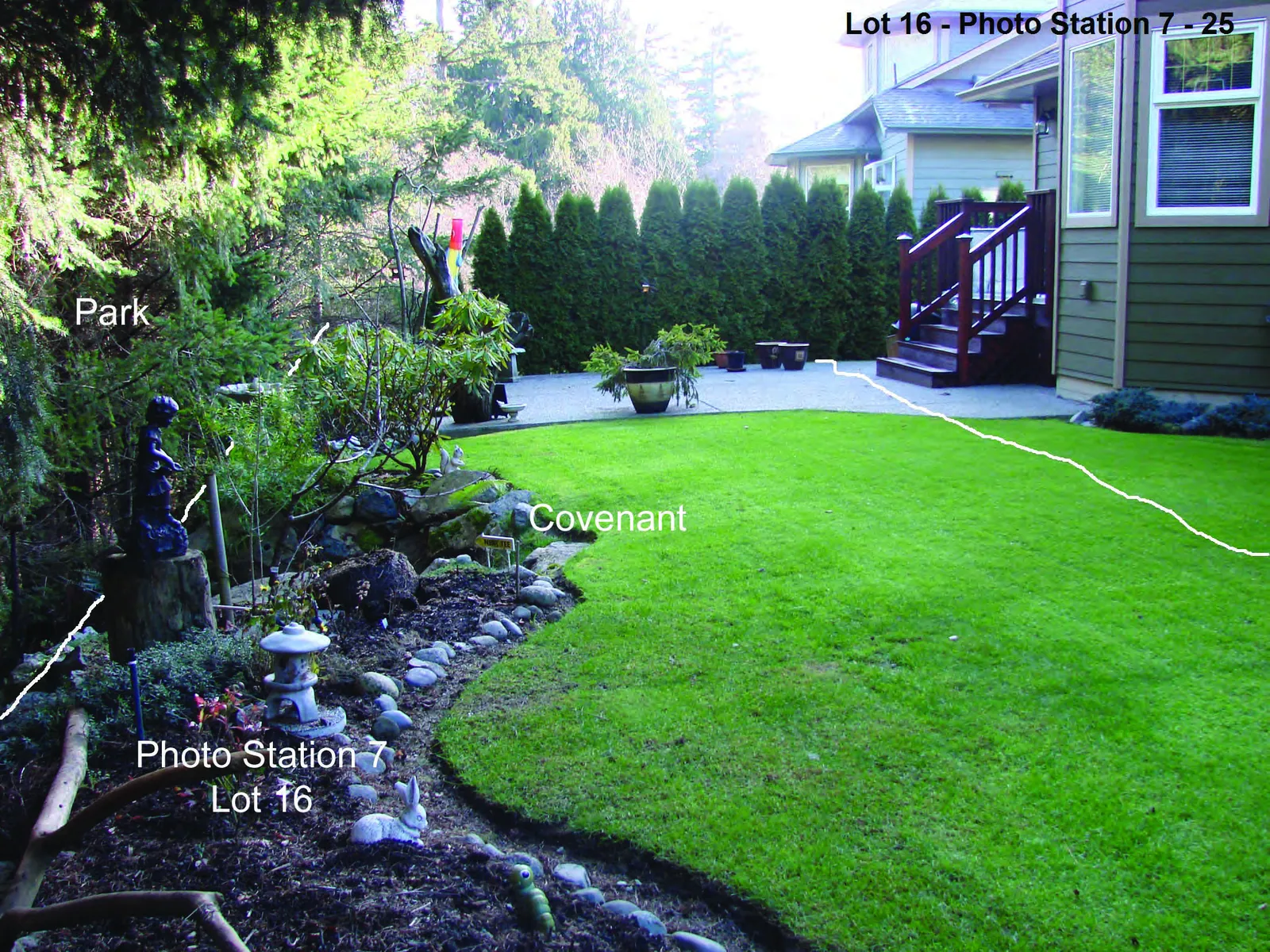 Photograph showing garden refuse and a rock wall within the Lot 16 covenant area
