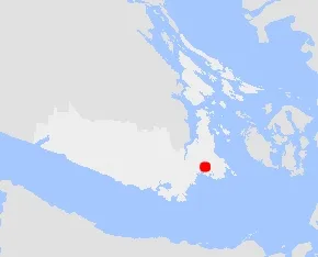 Regional inset map indicating the location of the subject property with a red dot on the southern end of Vancouver Island.