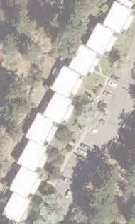 Aerial view of several residential buildings and road network