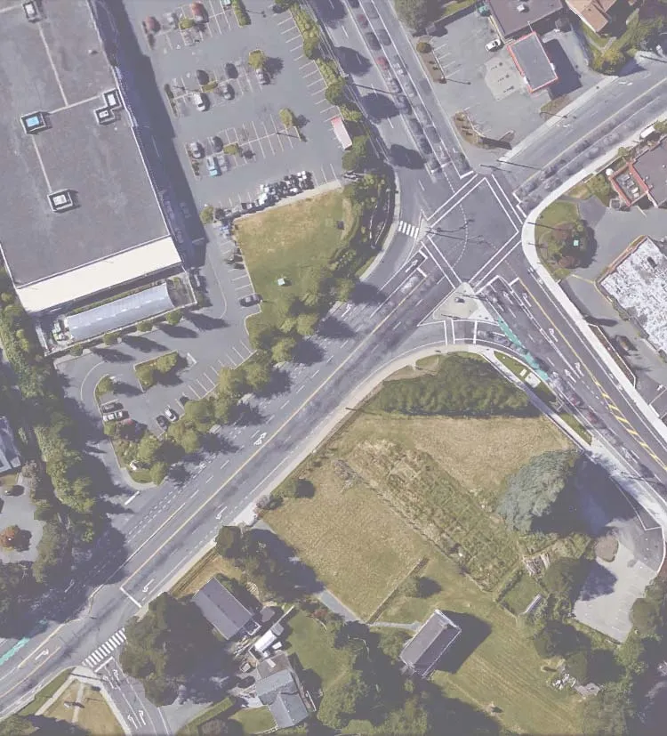 Aerial map of the intersection of Island Highway, Admirals Road, and Shoreline Drive with overlaid traffic performance data for 2028 PM background conditions.