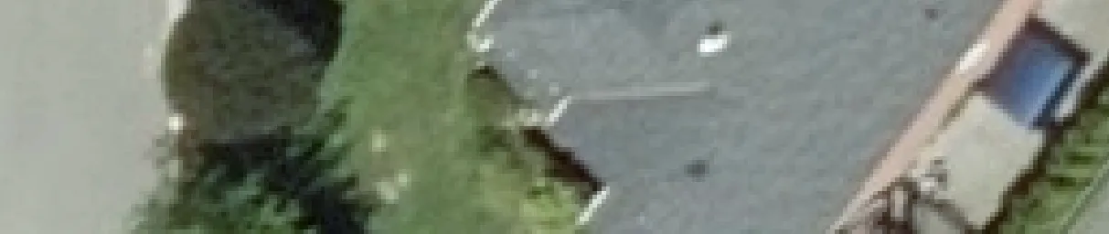 Aerial view crop of a house and yard boundary