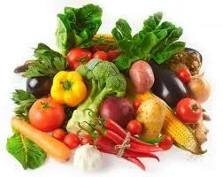 Assorted fresh vegetables including broccoli, peppers, and tomatoes