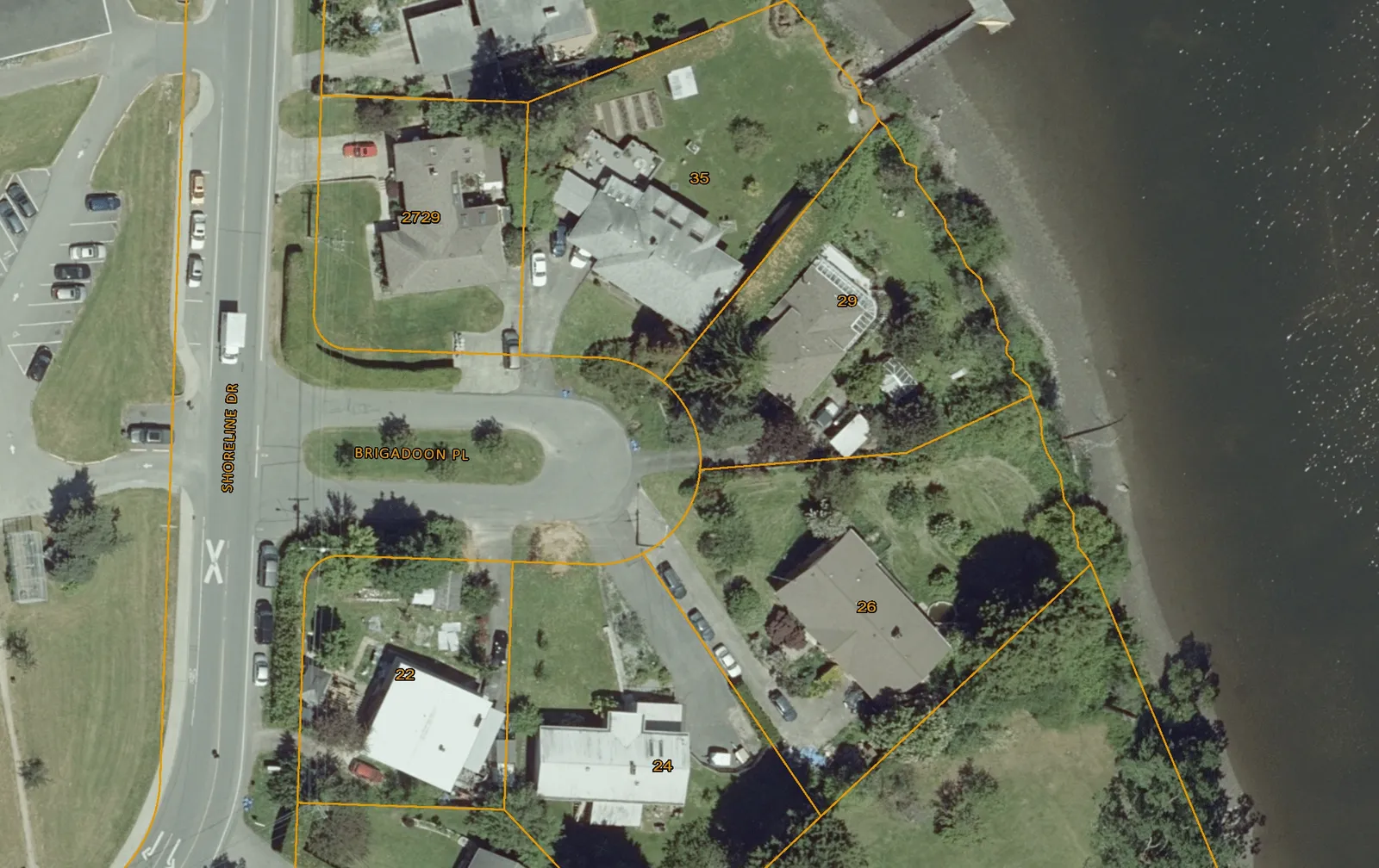 Aerial map showing property parcels at the intersection of Shoreline Dr and Brigaddon Pl, featuring house numbers 2729, 35, 29, 26, 24, and 22